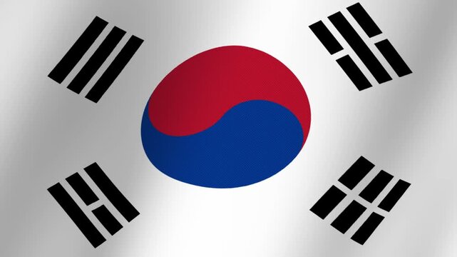 Close up of the South Korean flag waving gently showing the Taegeuk symbol and trigrams
