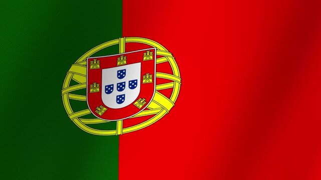 The national flag of Portugal waving gently with its iconic green and red colors and the coat of arms featuring castles and shields