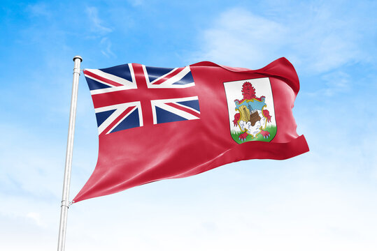Bermuda national flag waving against blue sky