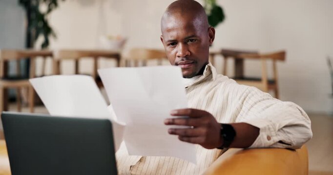 Reading, paperwork or black man with remote work on sofa, narrative summary or check story proposal. Review, freelancer or publishing agent with plot analysis for potential evaluation, laptop or home