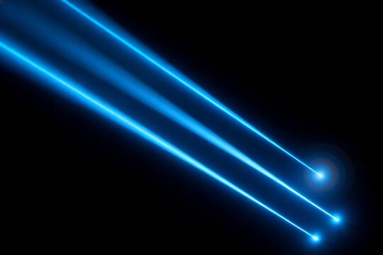 Blue Laser Beams Cutting Through Dark Background