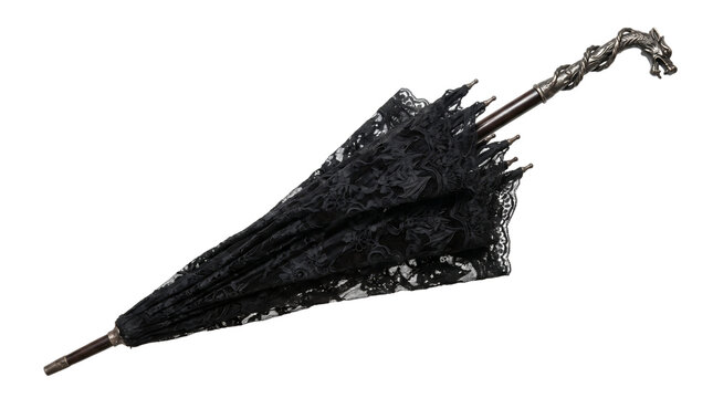 Elegant closed Victorian umbrella made of black gothic lace fabric with an ebony wood handle