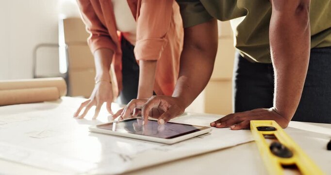 Blueprints, tablet and hands of couple in new home with boxes for interior designing and online plans. Real estate, mortgage and people with digital tech for ecommerce purchase, talk and cooperation