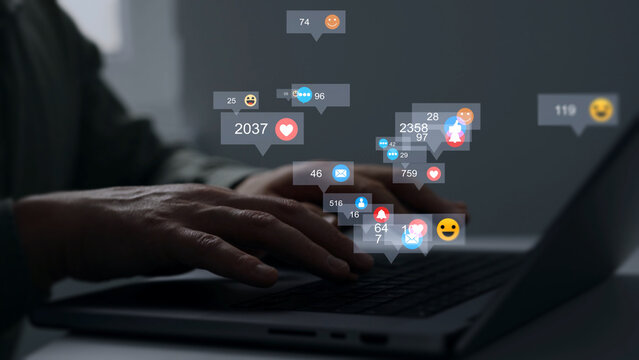 Man using smart phone with emoticon icons of Social Media.Interactive with friends on chat with emoticon feedback.Social media,marketing, like,social network,blog,live,chat reaction and livestream.	

