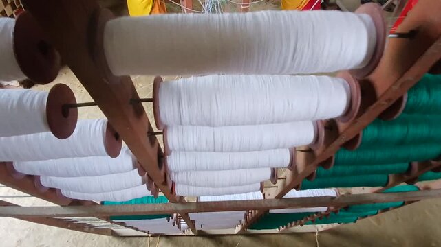 Close view of handloom bobbins.