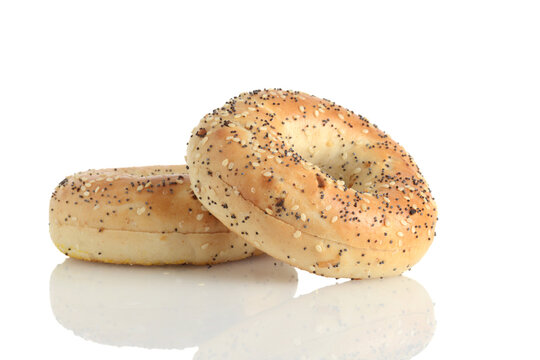 closeup of two everything seasoned bagels