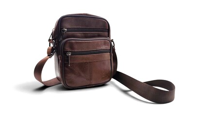 Photo of a classic brown leather crossbody (or messenger) bag with multiple zippered pockets. © Antonios