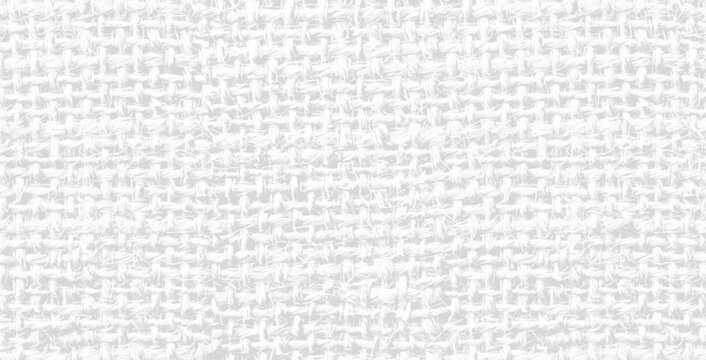 A close up view of a light grey, woven fabric texture resembling coarse linen or white canvas.