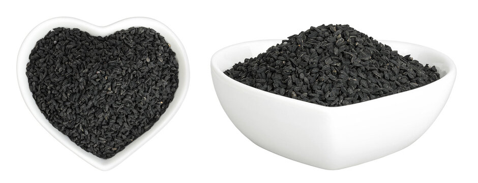 Nigella sativa or Black cumin in ceramic bowl isolated on white background. Top view. Flat lay.