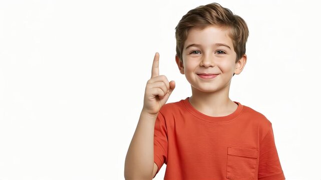 A boy who smiles and holds up his index finger to convey ideas and discoveries.
