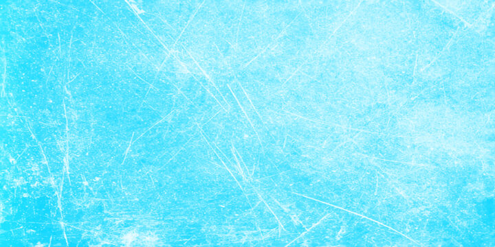 Vibrant soft sky or ocean blue grunge textured background with scratches and scuffs for design and artistic projects