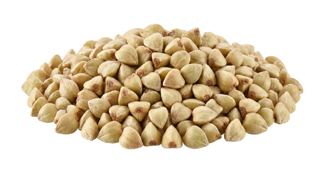 A small pile of raw, unroasted buckwheat groats on a white background