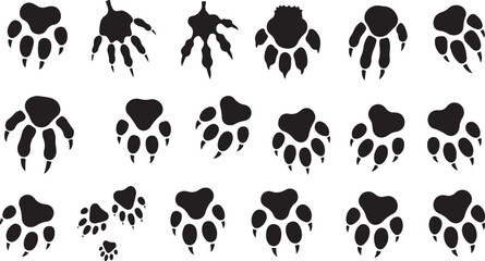 Fototapeta premium A collection of high-contrast black vector paw prints, featuring various animal track patterns, perfect for wildlife-themed design, educational materials, or outdoor-inspired branding.