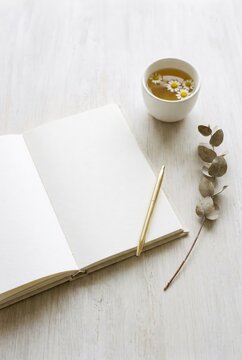 Open Notebook Pen Herbal Tea White Table Minimal