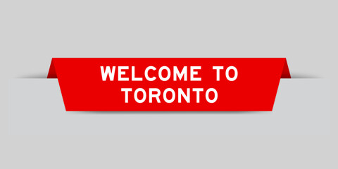 Naklejka premium Red color inserted label with word welcome to toronto on gray background