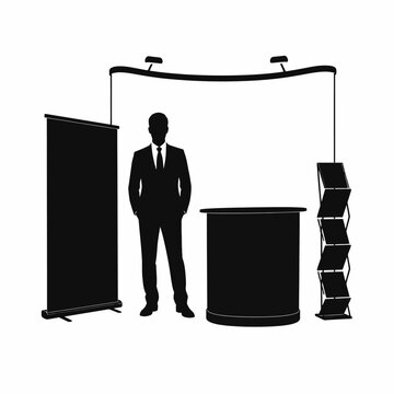 Businessman stands proudly next to a professional exhibition booth and black marketing display.