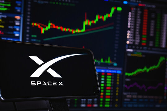 SpaceX AI-Infrastructure Company's Valuation Past $2 Trillion, NASDAQ: SPCX Initial Public Offering (IPO) Logo Displayed On Smartphone, Stock Chart, London, UK - June 2026
