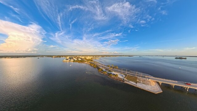 Aerial View of Dunedin Causeway Bridge and Waterfront Condos at Sunset, Florida
