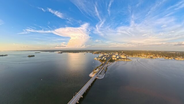 Aerial View of Dunedin Causeway Bridge and Waterfront Condos at Sunset, Florida