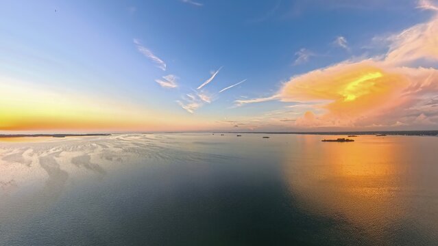 Aerial View of Dunedin Causeway Bridge and Waterfront Condos at Sunset, Florida