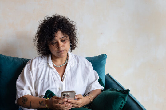 woman using smartphone, typing message or email