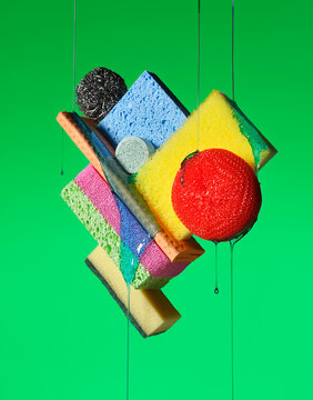 Still life with scouring pads, sponges and dishcloths.