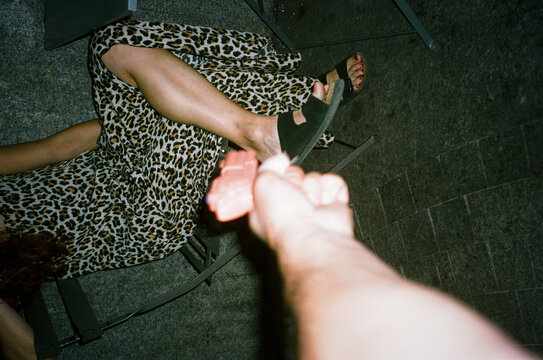 Woman Sitting on Chair With Leopard Print Dress