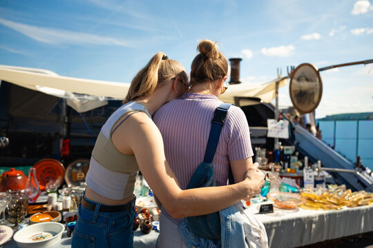 Same-sex couple at vintage market stall in Amsterdam