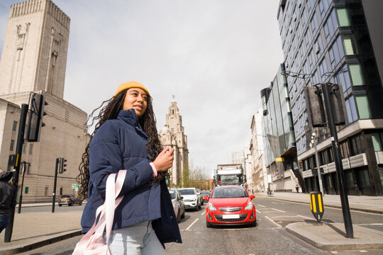 Woman in Yellow Hat Crossing Liverpool Street