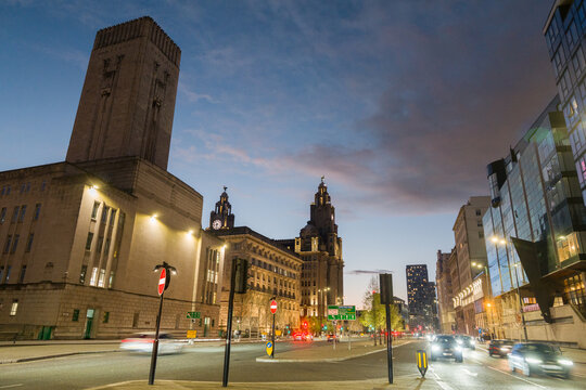 City Street in Liverpool During Dusk With Traffic Flow and Buildings