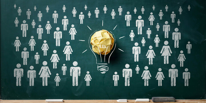 Crowd of people figures surrounding paper lightbulb on chalkboard representing collective innovation, crowdsourcing and community driven ideas