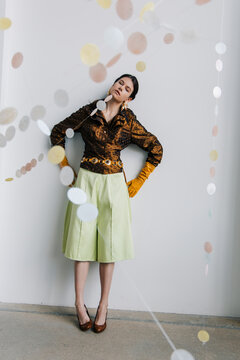 Full length retro fashion portrait with satin textures