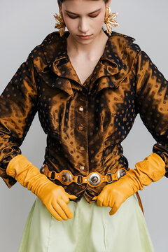 Maximalist editorial styling with satin polka dots and gloves