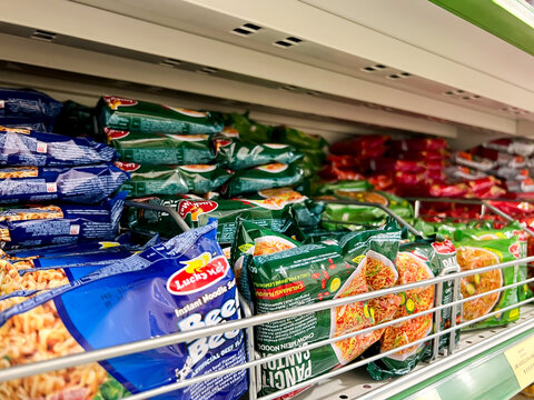 Reading, UK - June 13 2026: Packets of Lucky Me instant noodles stacked on a shelf in a supermarket