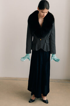 Vintage-inspired fashion editorial with fur collar and satin gloves