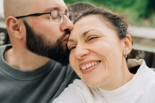 Happy Couple Sharing Affectionate Moment Outdoors