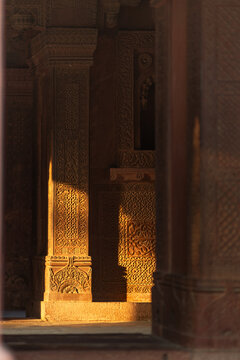 Carved sandstone interior detail in warm morning light
