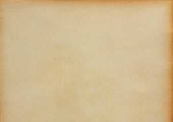 Obraz premium Aged, textured beige paper with subtle stains and a vintage look.