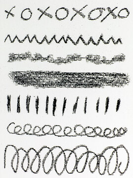 hand-drawn charcoal design elements created on rough white paper. Includes scribbles, loops, waves, abstract lines, textured strokes, hatch marks, and graphic accents
