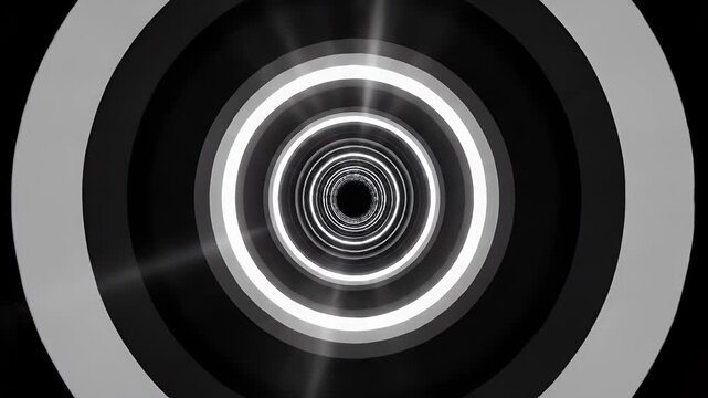 A visually striking tunnel with concentric glowing circles leading to a dark center.