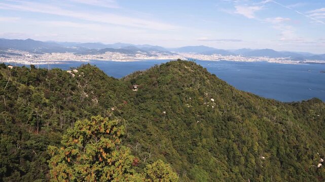 Itsukushima island landscape view, hiking to Mount Misen, Miyajima island panorama, with Hiroshima bay and Seto Inland Sea archipelago, Japan, Hiroshima prefecture, Setonaikai National Park islets