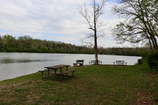 The picnic area at the lake on a cloudy spring day.