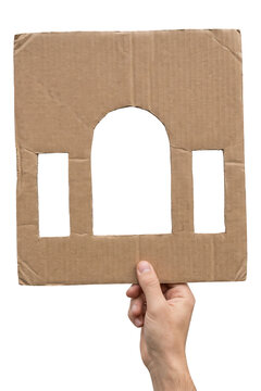 Cardboard cutouts of an arched door and two rectangular windows isolated on transparent background