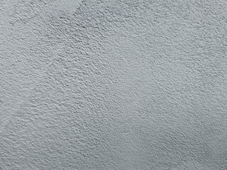 Fototapeta premium Fine grainy grey plaster wall texture background. Abstract soft concrete stucco surface backdrop.
