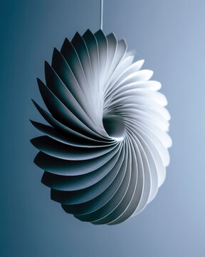 White Spiral Paper Sculpture With Shell Inspired Abstract Form