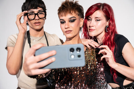 Fashion photoshoot crew taking a selfie backstage together