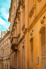 Fototapeta premium November 6, 2024 Valetta Malta. Mdina Gate, also known as the Main Gate or the Vilhena Gate, is the main gate into the fortified city of Mdina, Malta. It was built in the Baroque style in 1724 
