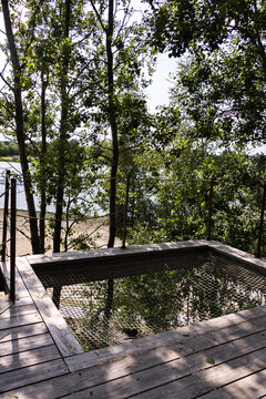 Sunken net hammock on lakeside deck