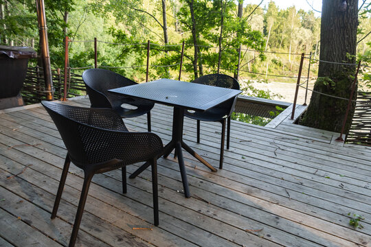 Forest deck with table and chairs