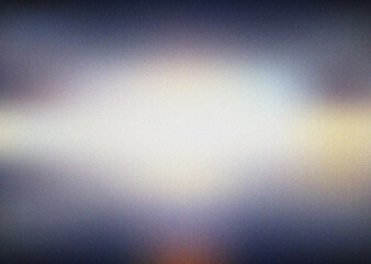 Dramatic glowing light band amidst deep blue and purple tones with a fine textured grain overlay © NajninNahar